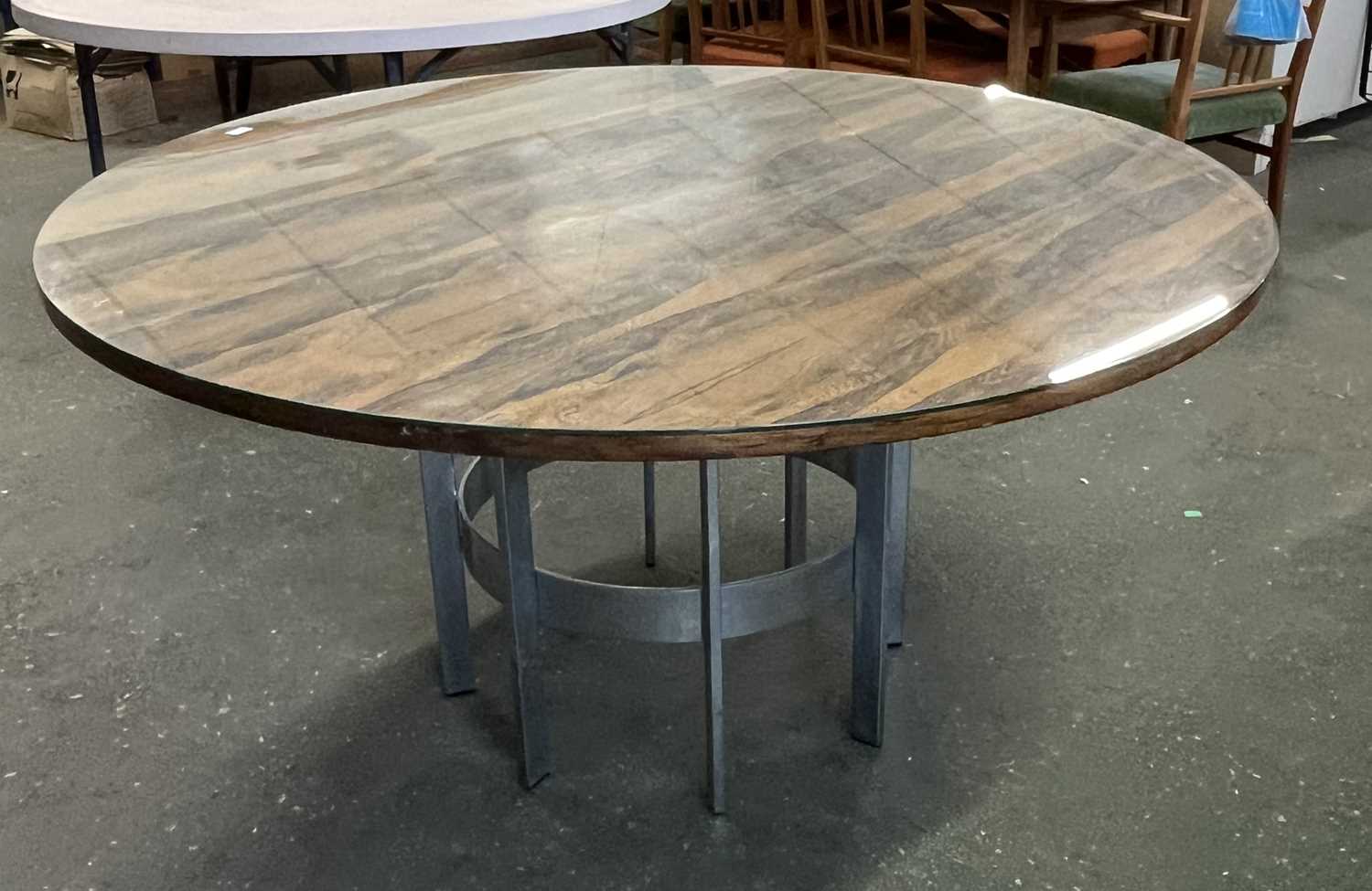 Merrow Associates rosewood veneered pedestal dining table with circular top raised on a chrome