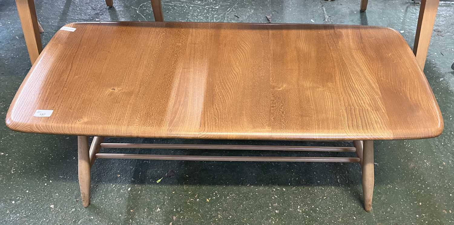 An Ercol light elm coffee table of rectangular form with base shelf, 105cm wide