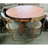 A G-Plan teak extending dining table and four accompanying chairs, table 120cm diameter