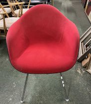 A Herman Miller contemporary red upholstered tub type chair