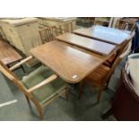 Archie Shine mid Century extending dining table of tapering rectangular form with two accompanying