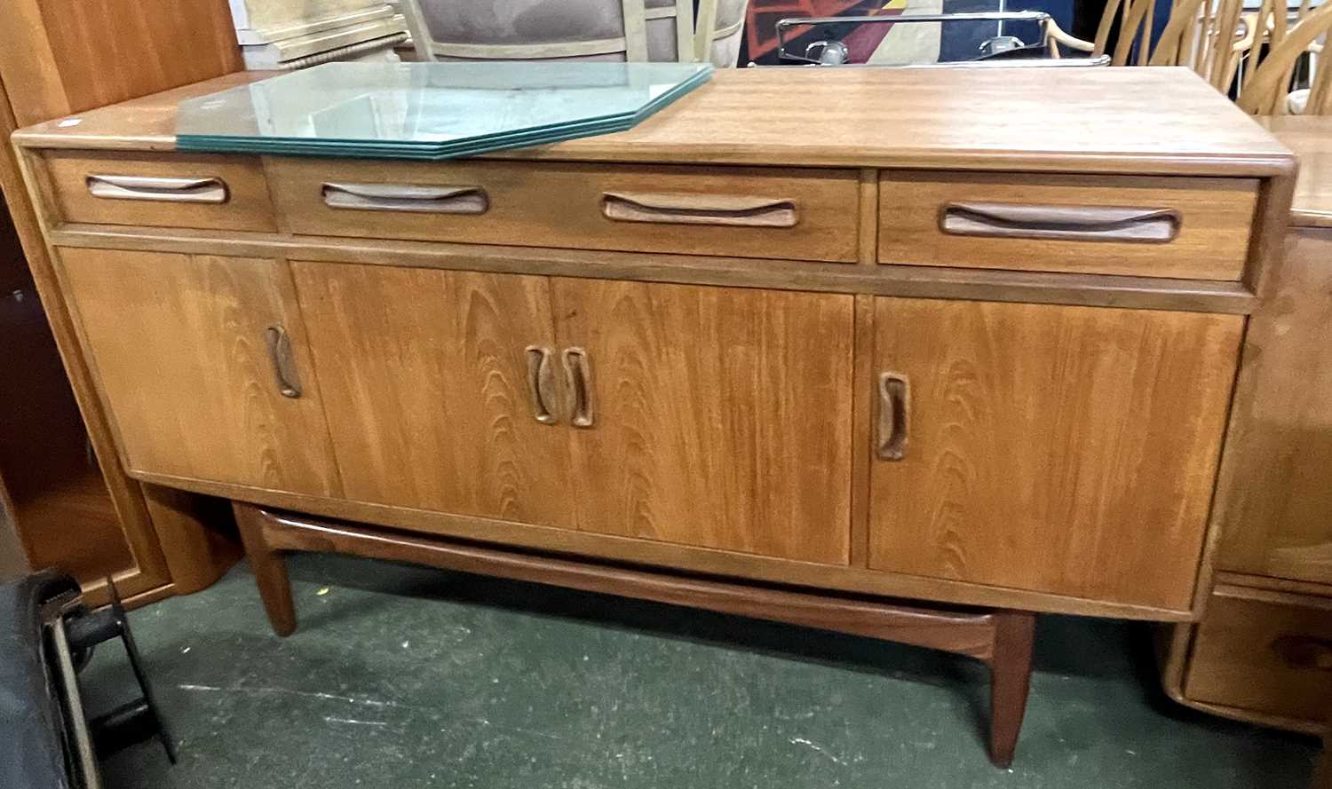 Mid Century teak G-Plan sideboard with three drawers over four doors, 151cm wide
