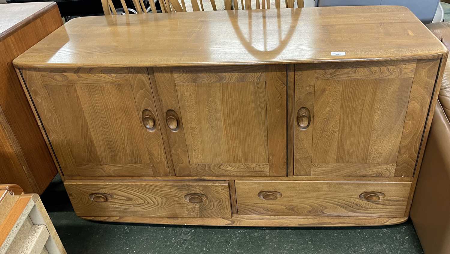 An Ercol light elm sideboard with three doors over two drawers, 130cm wide - Image 3 of 3
