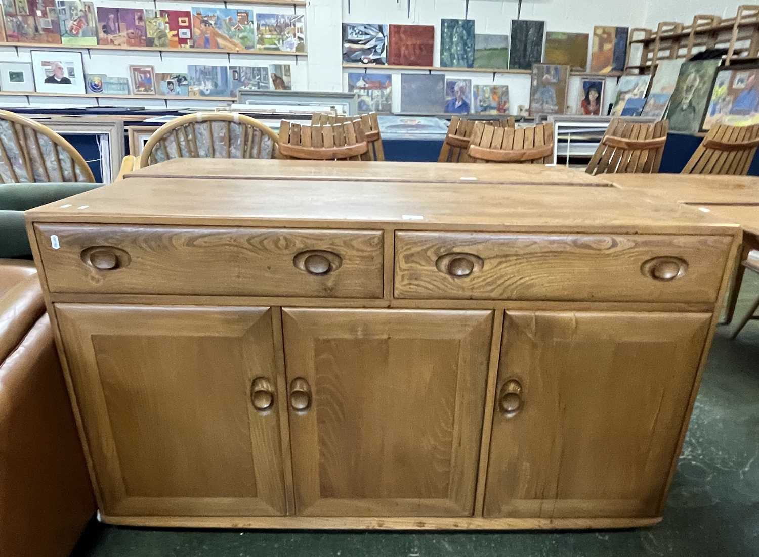 An Ercol light elm sideboard with two drawers over three panelled doors, 135cm wide - Bild 2 aus 3