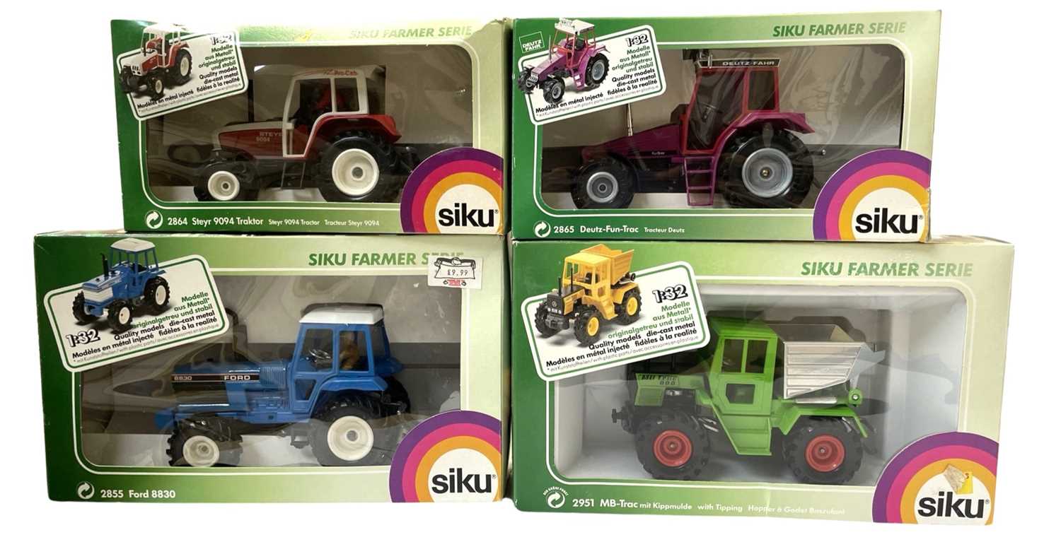 Four boxed 1:32 scale Siku die-cast tractor models, to include: - Steyr 9094 - Ford 8830 - Deutz-