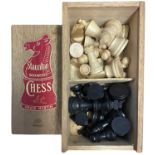 A wooden boxed set of Staunton chess pieces