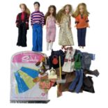 A collection of four vintage Pippa Dolls / one Pete doll, together with dolls clothing