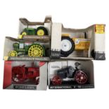 Five boxed die-cast model tractors, to include: - Scale Models - Minneapolis-Moline G940 - Scale