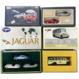 Three boxed Corgi die-cast scale model sets, to include: - Jaguar triple set - Bedford OB Coach -