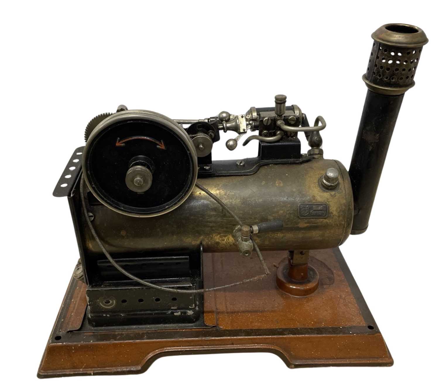 A vintage Marklin stationary steam engine, stamped to base A W Gamage, Holborn, London