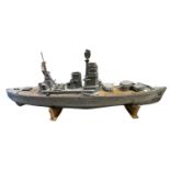 An incredibly large and impressive steam-powered naval battleship model. Highly detailed,