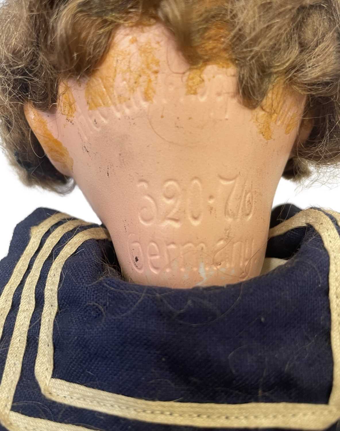 A bisque head Heubach Koppelsdorf doll, dressed in sailor's outfit. Marked to rear of head: - Bild 4 aus 4