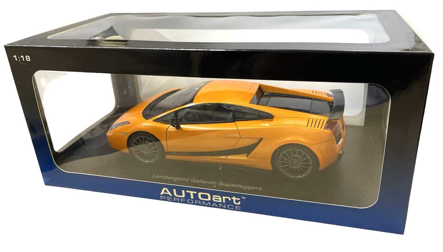 A boxed AutoArt 1:18 scale model Lamborghini Gallardo Superleggera, in bright orange