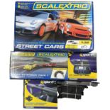 A collection of various Scalextric boxed sets, to include: - Street Cars: Porsche 997 GT3 RS