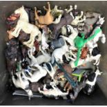 A collection of plastic farm animals, mostly Britains