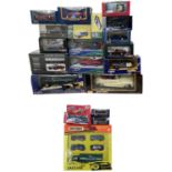 A large collection of various die-cast Jaguar and Aston Martin models in original boxes