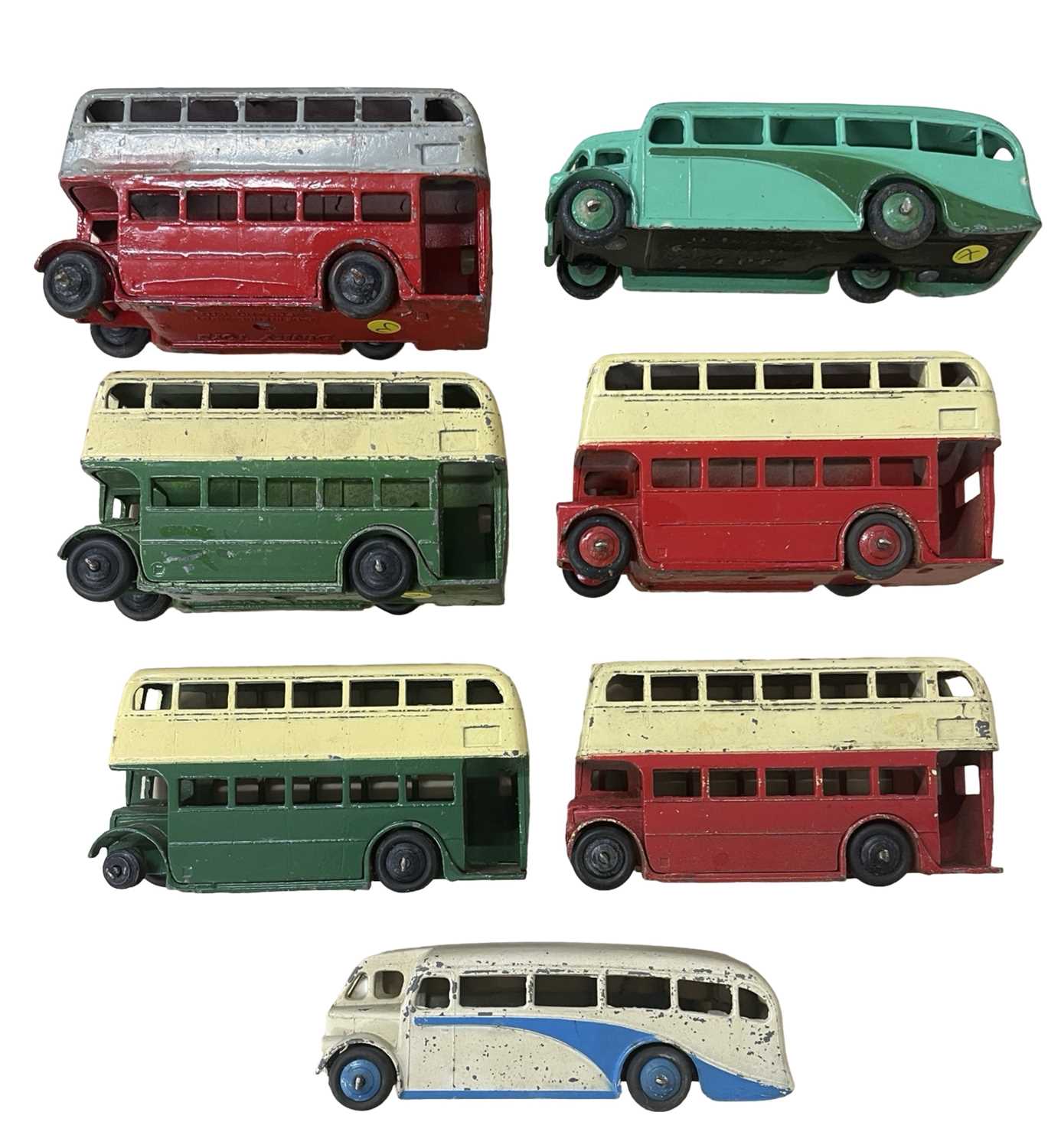 Seven Dinky Toy buses, playworn and some possibly repainted.