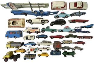 A mixed lot of playworn die-cast Corgi toys