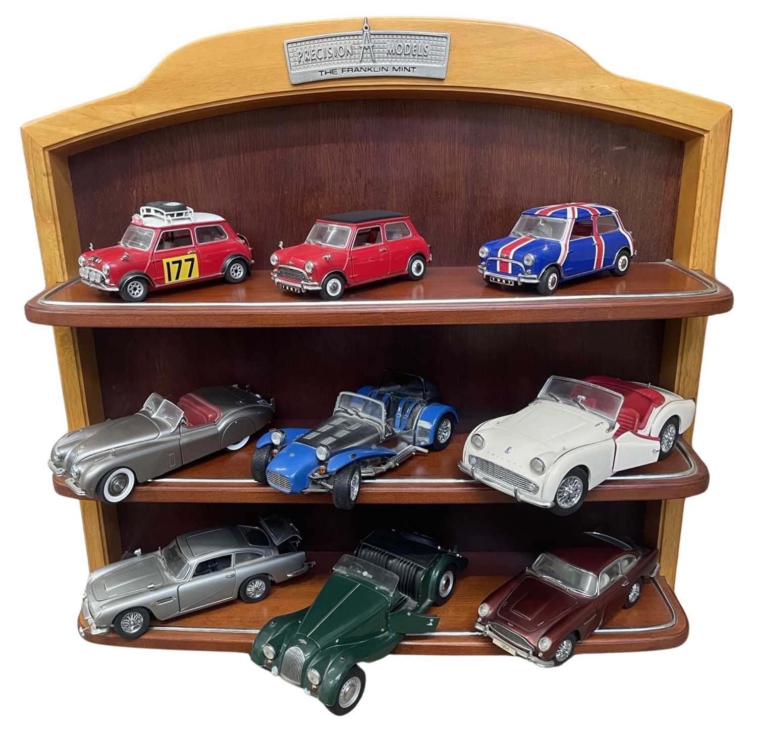 A further Franklin Mint branded shelf, 'Precision Models', together with a collection of carious