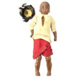 A small Bahr and Proschild bisque head doll, with brown eyes and teeth showing, pierced ears and