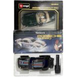 A pair of boxed car models, to include: - An electronic sonic controlled Porsche Turbo by Rojo