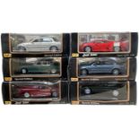 A group of six boxed Maisto 1:18 scale jaguar models, to include: - XJ220 in red and metallic