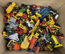 A large collection of various die-cast vehicles, mostly farming / construction.