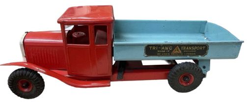 A c1950s Triang Transport flatbed tipper truck.