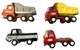 Four pressed steel Tonka toys