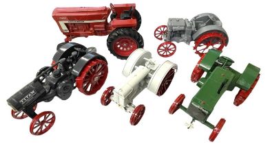 Five large-scale die-cast tractor models