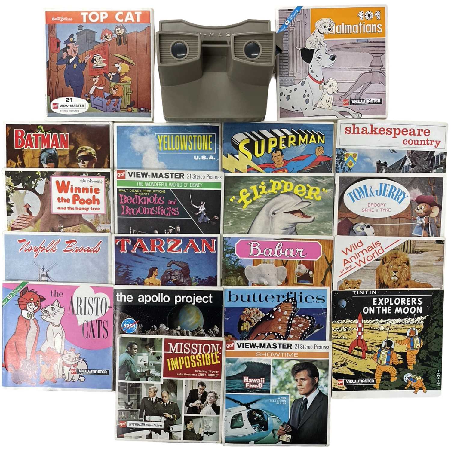 A Viewmaster with a quantity of slide sets, mostly films/cartoons