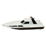 A large remote controlled speedboat on stand. Length approximately 96cm