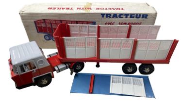 A vintage pressed steel 'tractor and trailer' model by Joustra, in original box. Some some damage