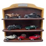A Franklin Mint branded shelf, 'Precision Models', together with various scale model cars and