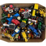 A large box of various die-cast tractor models of various makes