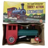 A Marx battery operated Tricky Action locomotive, in original box