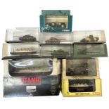 A collection of various cased die-cast tanks and ships