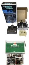 Various radio control units, to include: - A Boxed TAMCO - A boxed Futuba - Focus 4 - Fastlane - BOX