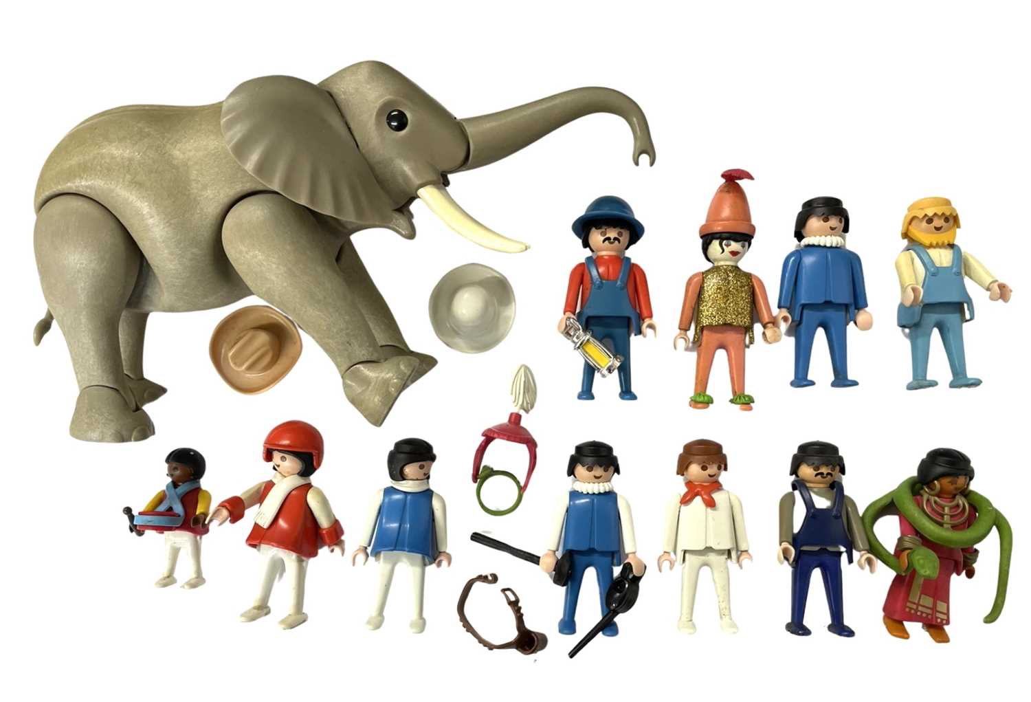 A collection of various 1980s Playmobil figurines plus elephant