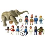 A collection of various 1980s Playmobil figurines plus elephant