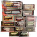 A collection of various cased Corgi Omnibus buses