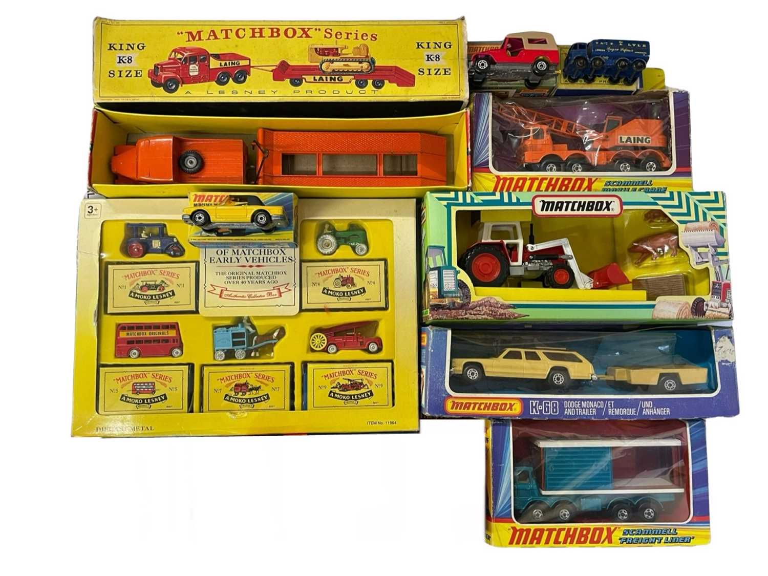 A mixed collection of various boxed Matchbox vehicles