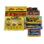 A mixed collection of various boxed Matchbox vehicles