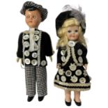 A pair of 1970s celluloid dolls, formed as a Pearly King and Queen. Length approximately: 18cm