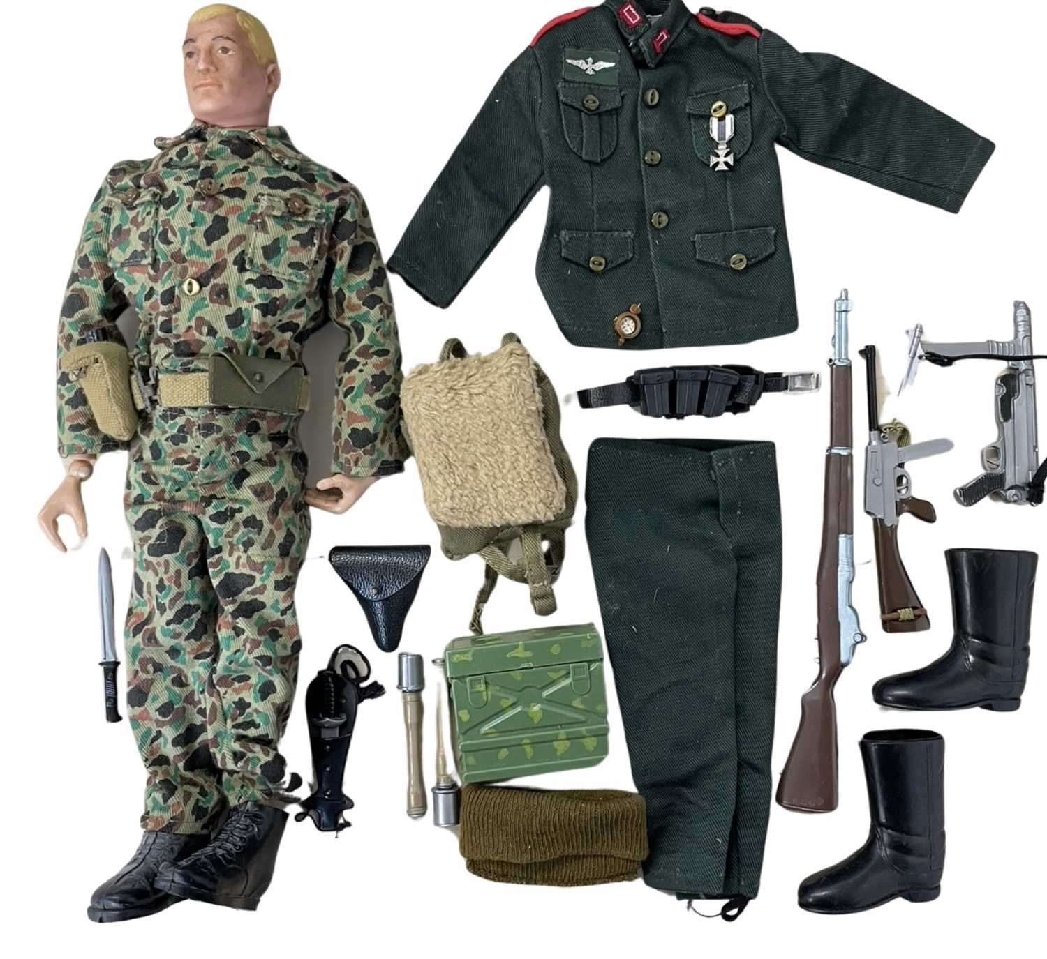 A 1964 Palitoy Action Man figure, together with an extra outfit and accessories.