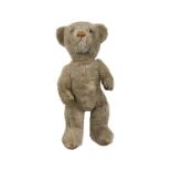 A vintage teddy bear, no makers mark. Length approximately: 43cm