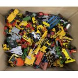 A large collection of various die-cast vehicles, mostly farming / construction.