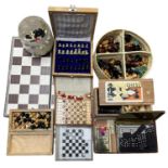 A mixed collection of various chess sets and pieces (unchecked for completeness)