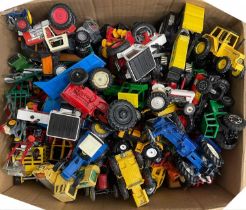 A large box of various die-cast tractor models of various makes
