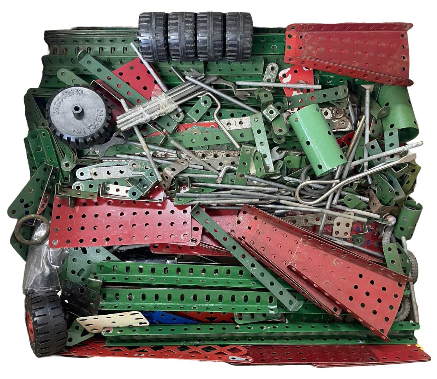 A quantity of Meccano, together with instruction manuals 1-5 and a copy of Meccano Magazine